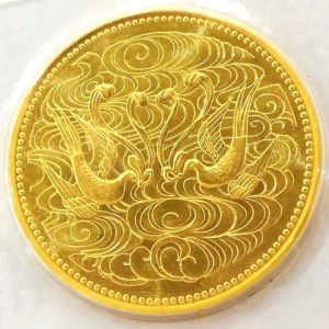 24金(K24) 記念品 天皇陛下御在位60年記念10万円金貨 買取相場