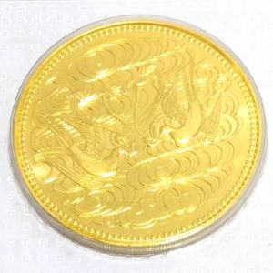24金(K24) 記念品 天皇陛下御在位60年記念10万円金貨 買取相場