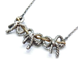 ティファニー(Tiffany＆Co) ネックレス トリプルリボン K18 SV925 買取相場