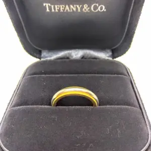 ティファニー(Tiffany＆Co) ミルグレインバンド リング K18 Pt950 #6.5 Bランク 買取相場