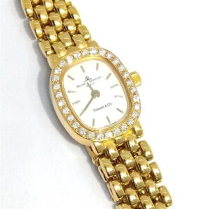 ティファニー・ボームアンドメルシェ(Tiffany・BAUME＆MERCIER) Wネーム 金無垢時計クォーツ K14YG ダイヤベゼル ホワイト文字盤 ABランク 買取相場